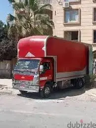 سيارات نقل اثاث في شارع قولة