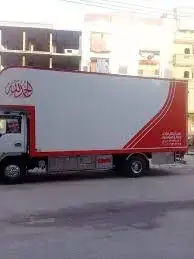 سيارات نقل الاثاث في شارع الملك فاروق